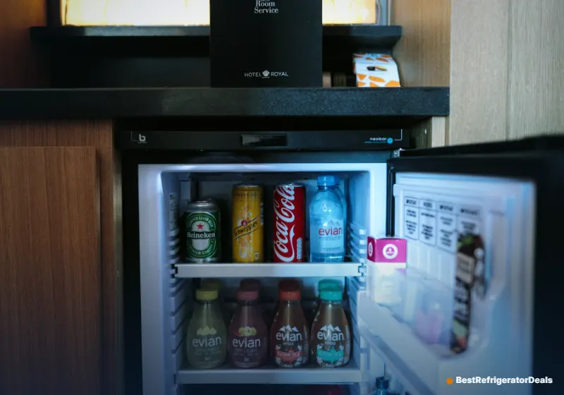 Compact mini fridge stocked with drinks